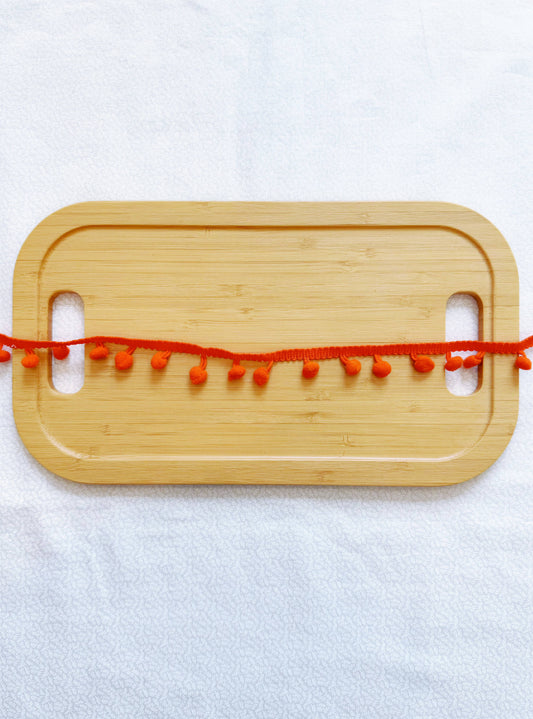 Orange Pom Pom Trim