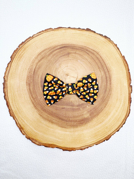 Tossed Candy Corn and Pumpkins Bow